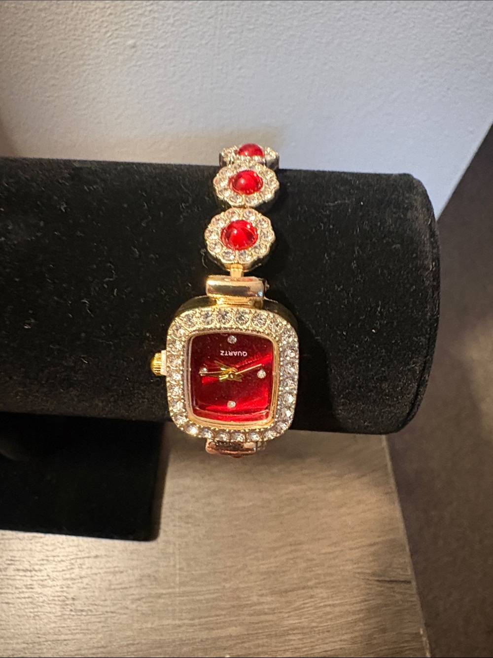 Women's Gold-Tone Bracelet Watch with Red Dial and Crystal Accents, Cracked Face
